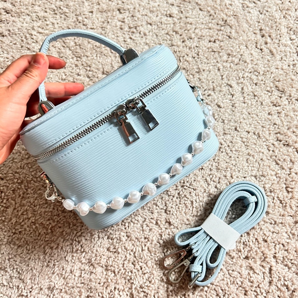 Vanity bag with faux pearl charm